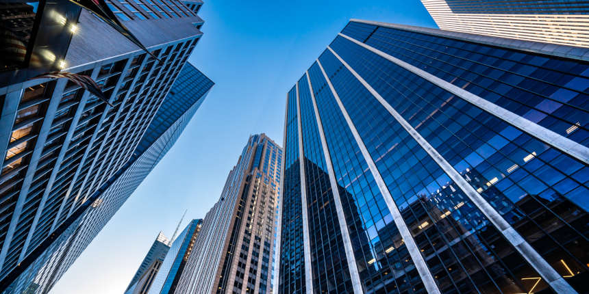 Low angle view of modern skyscrapers in Midtown Manhattan.